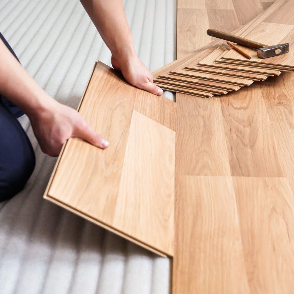 Experienced contractor reviewing framing measurements and renovation details inside Redmond residential project