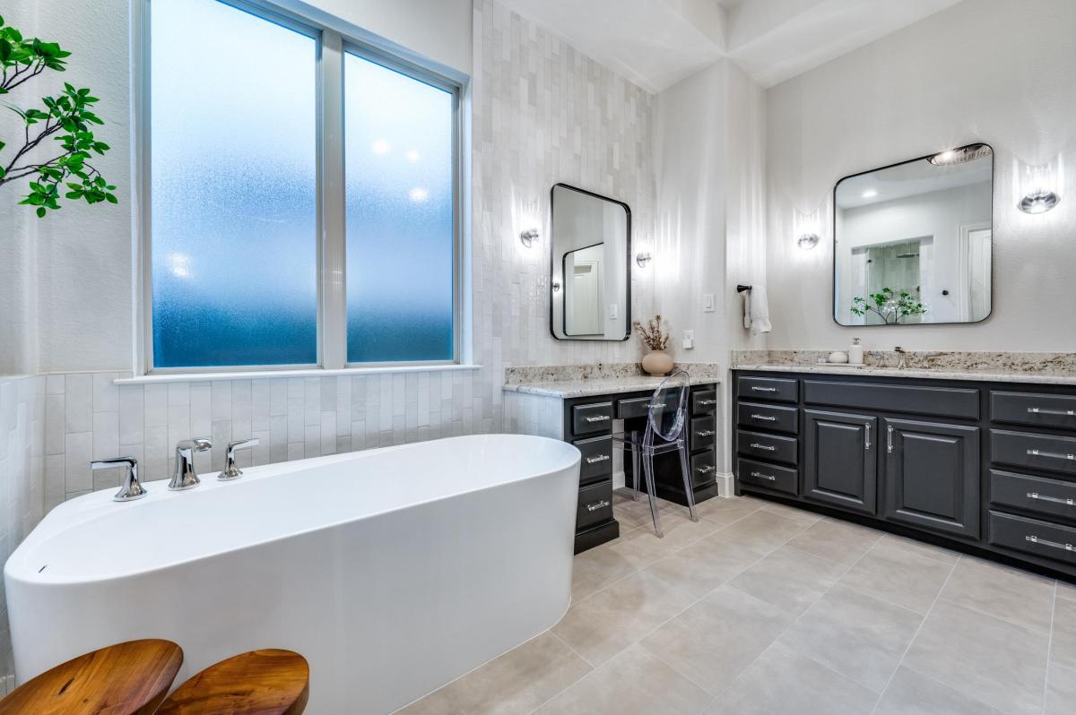 Remodeled bathroom with floating vanity and glass shower in Sammamish home