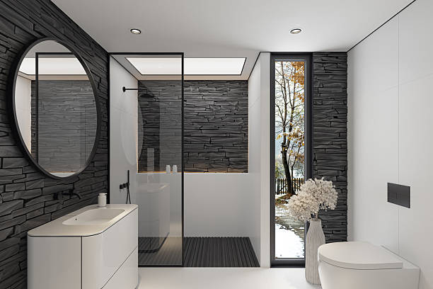 Shower Remodel in Redmond, WA in progress as a contractor installs large wall panels and fixtures